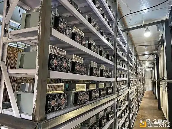 Technician monitoring mining rigs with diagnostic tools in a high-tech mining hosting center